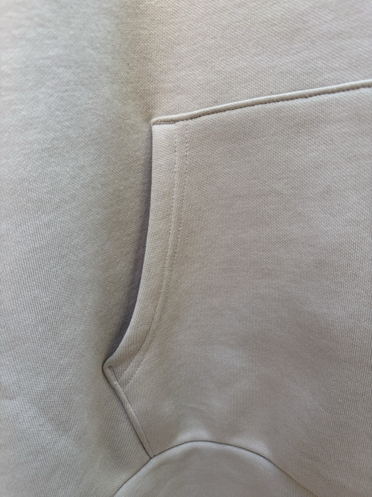Original photograph of the hoodie pocket stitching